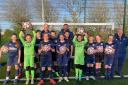 Members of FC Darlington Locomotives Under-12s with their balls donated by Darlington Building Society