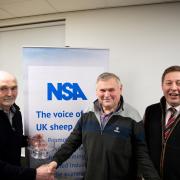 John Stephenson from Bishop Auckland, County Durham, centre receives his award