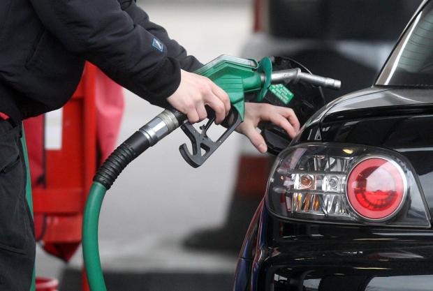 The Northern Farmer: Someone using a fuel pump at a petrol station (PA)