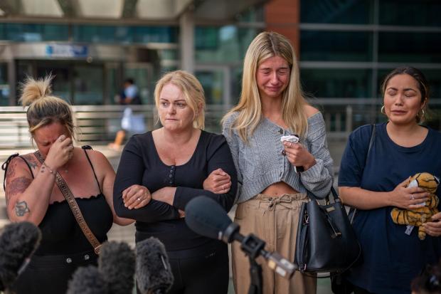 The Northern Farmer: Hollie Dance (second left) surrounded by family and friends, outside the Royal London hospital in Whitechapel, east London