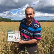 CAPITALISING ON TRENDS: Stephen Craggs in a spelt field with some products
