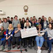 Members of Snainton Young Farmers’ Club and the Howarth family gathered for a formal cheque presentation to the MS Society York, Ryedale & District Group