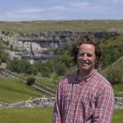 Neil Heseltine in front of Malham Cove