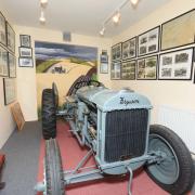 A tractor which is part of a collection of Massey Ferguson tractor memorabilia, described by auctioneers as most likely the largest in existence in the world, which is to go under the hammer